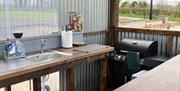 The outside covered BBQ area
