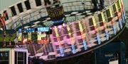Circular amusement covered in bright lights