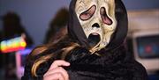 Person in Scary movie mask