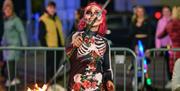 Skeleton fire juggler