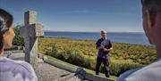 Overlooking beautiful views over Lough Neagh, Jim encourages the group to take time out to reflect