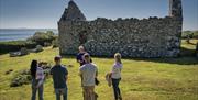 The Poetry & Prayers group stops at a spiritual site to ponder