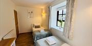 Twin bedroom with two single beds