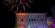 Fire works going off behind Ranfurly House