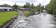 View of the market and boat from the river