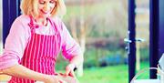 Image of Mary Anne mixing ingredients in a bowl