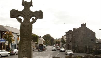 Image of Donaghmore High Cross and the town