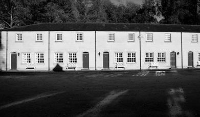 A black and white image of the front of the cottages 