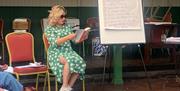 International best selling author Emma Hetherington reading from her novel during a lesson