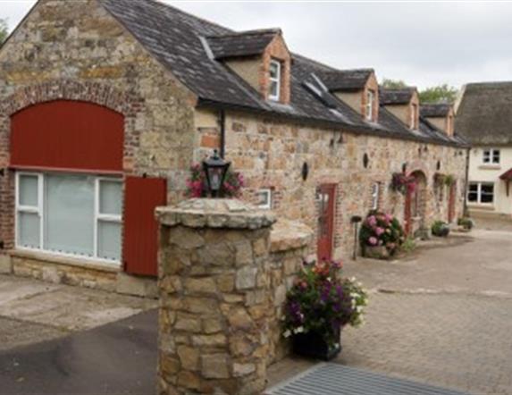 Row of cottages with stone walls