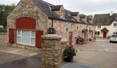 Row of cottages with stone walls 