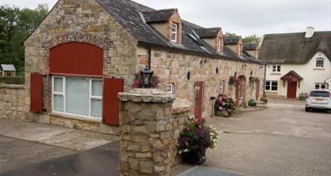 Row of cottages with stone walls