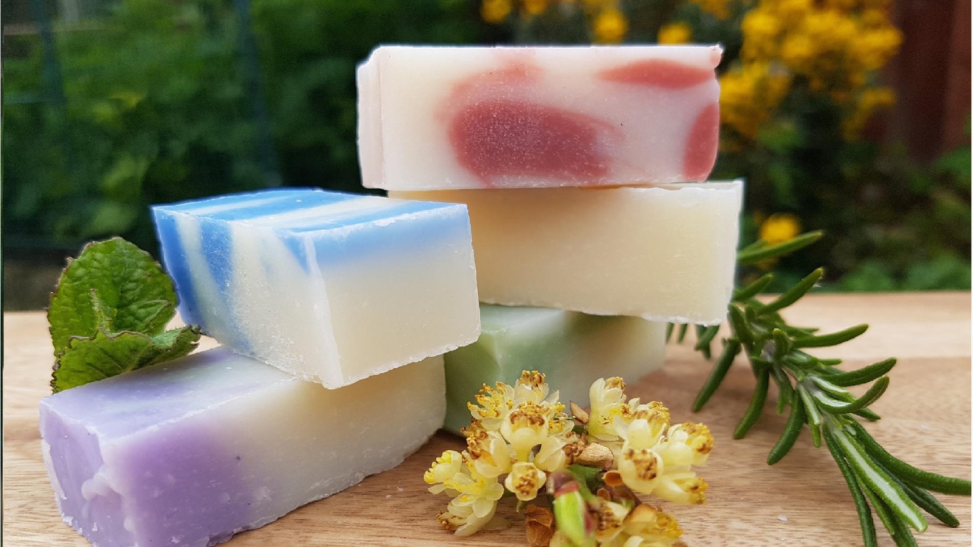 image of three bars of homemade soap stacked on top of each other image of three bars of homemade soap stacked on top of each other