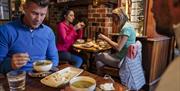 group of people dining at Friels Bar