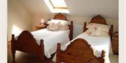 Image of two single beds
