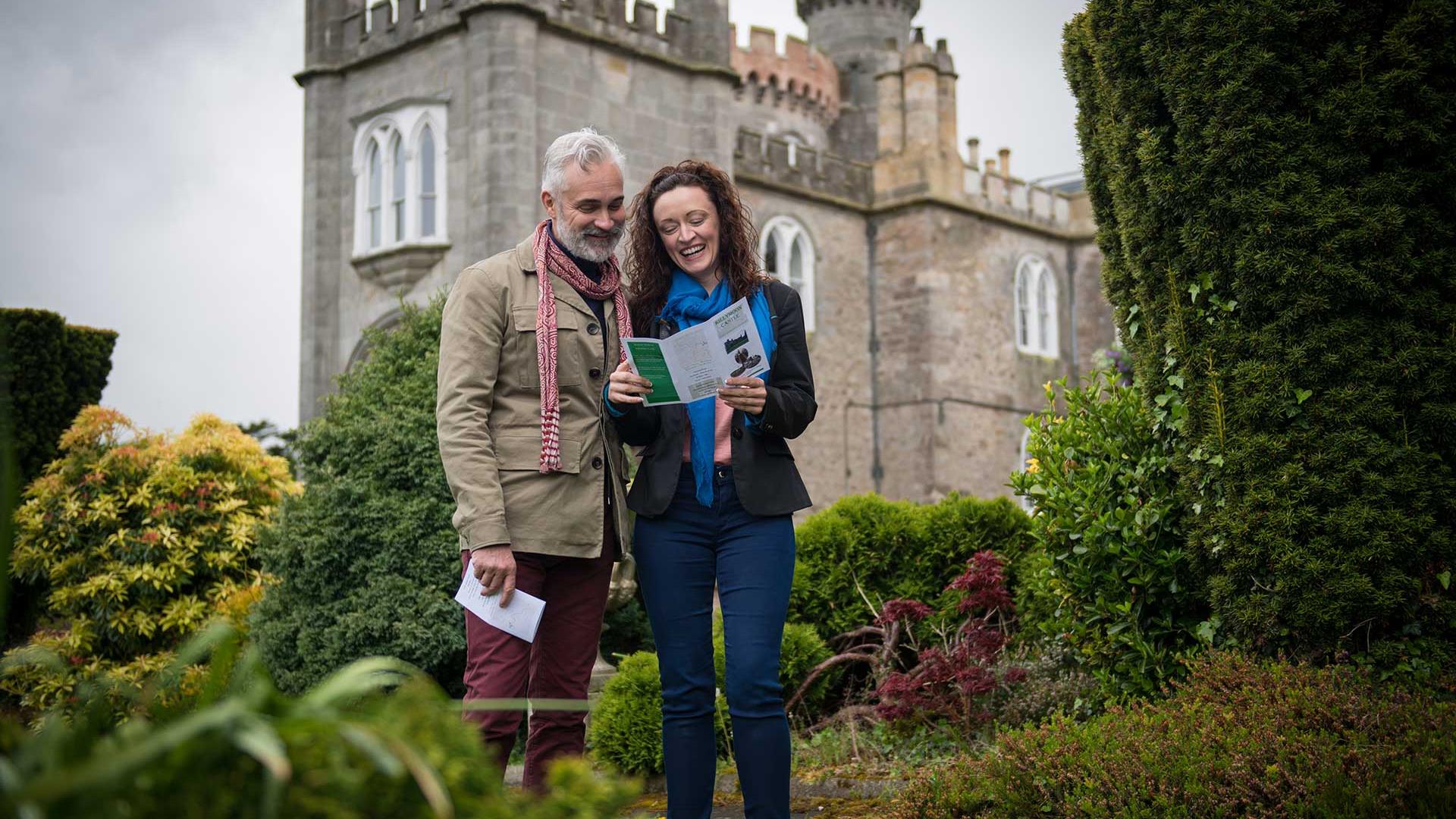 A picture of a man and woman standing outside Killymoon Castle