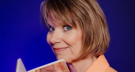 Image of Nuala McKeever holding a book