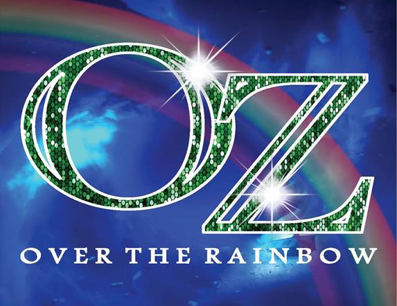 OZ written in sparkly green lettering on a blue background