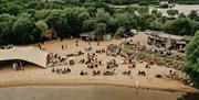 Arial view of the beach at Ballyronan filled with people
