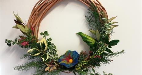 Image of a willow wreath with greenery