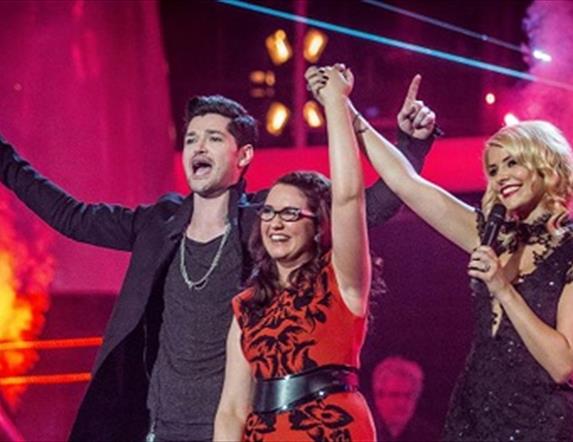 A picture of Andrea Begley with The Voice Coaches