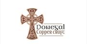 Image of a brown Celtic cross and Gonegal copper craft written