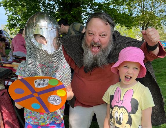A viking with two children at Delamont Country Park