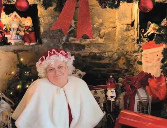 Mrs Claus with Christmas Decorations and Christmas Tree
