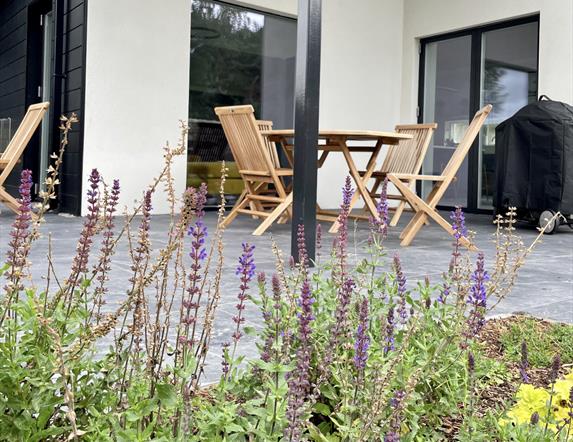 covered patio in the walled garden with Weber BBQ