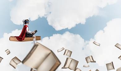 Child exploring books