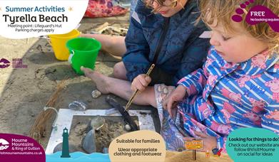 Children making beach art in Mourne Gullion Strangford Geopark.