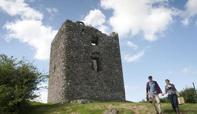 Moyry Castle with people walking