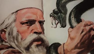 St Patrick holding a snake