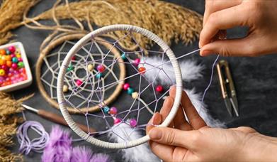 image of a dream catcher being made