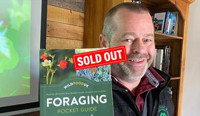 Brian with Foraging book