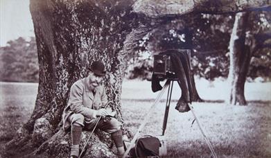 5th Earl Hugh Annesley with his new camera taken in 1883.
