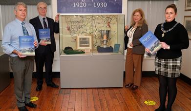 Launch photograph  of 'The Legacy: Newry 1920 - 1930' with Newry and Mourne Curator and Chairperson of Newry, Mourne and Down District Council, Counci