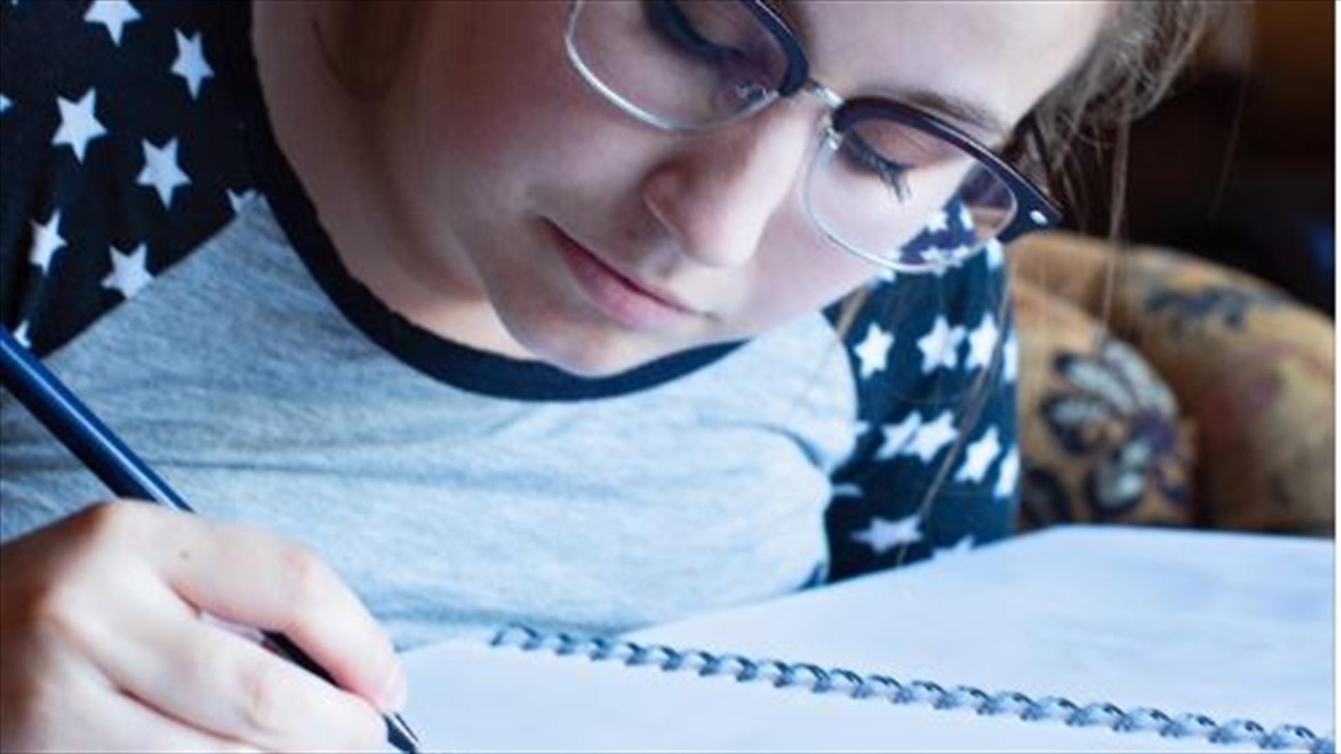 A person bird sketching in Castlewellan Forest Park