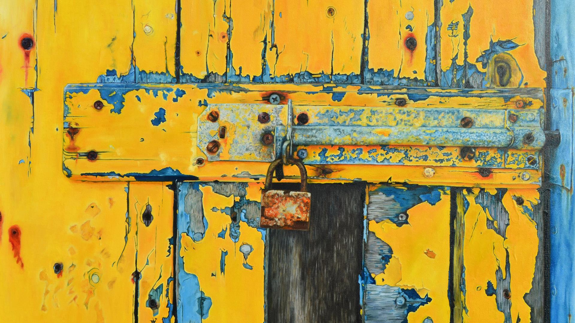 yellow gate with a lock