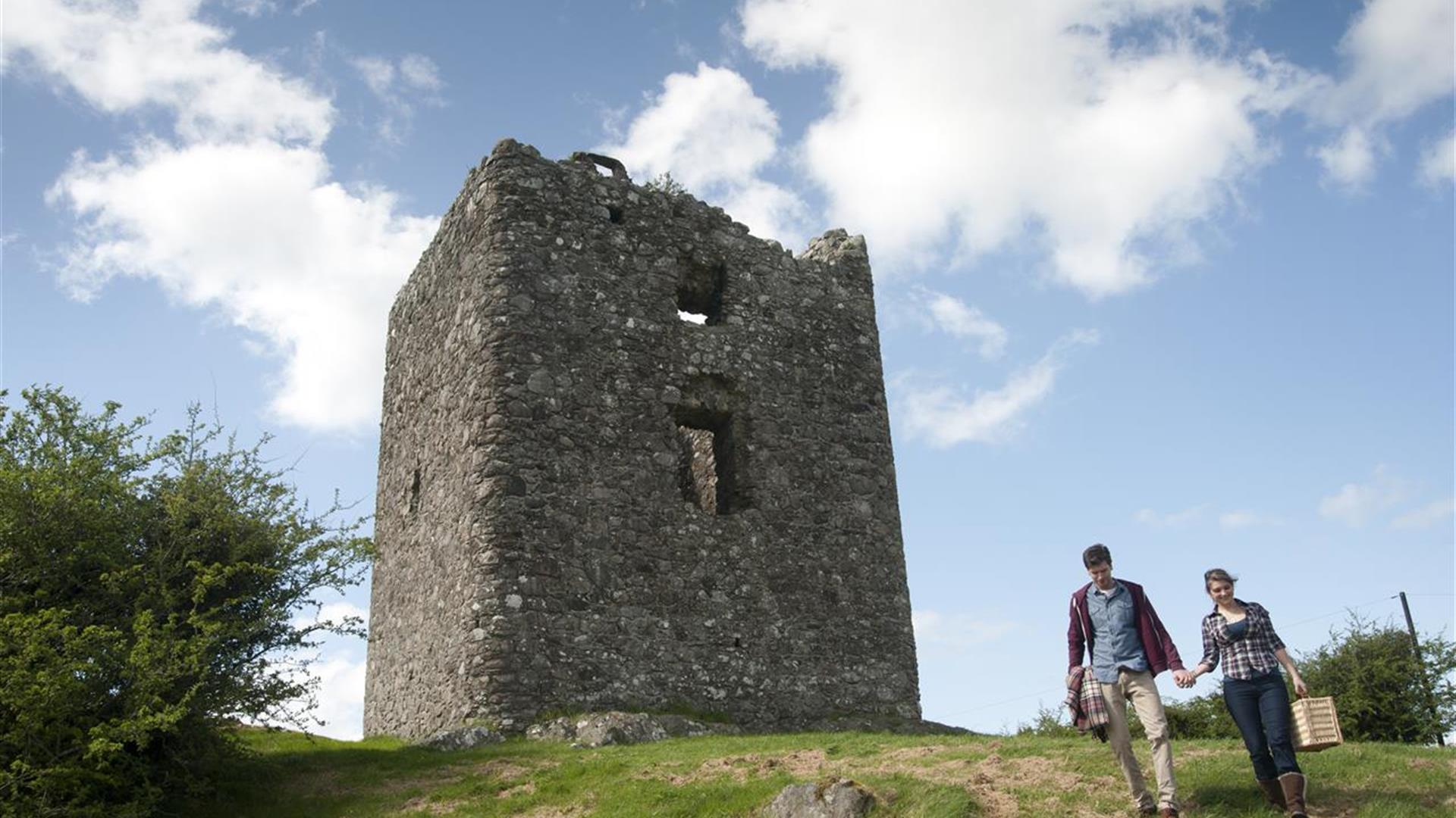 Moyry Castle with people walking