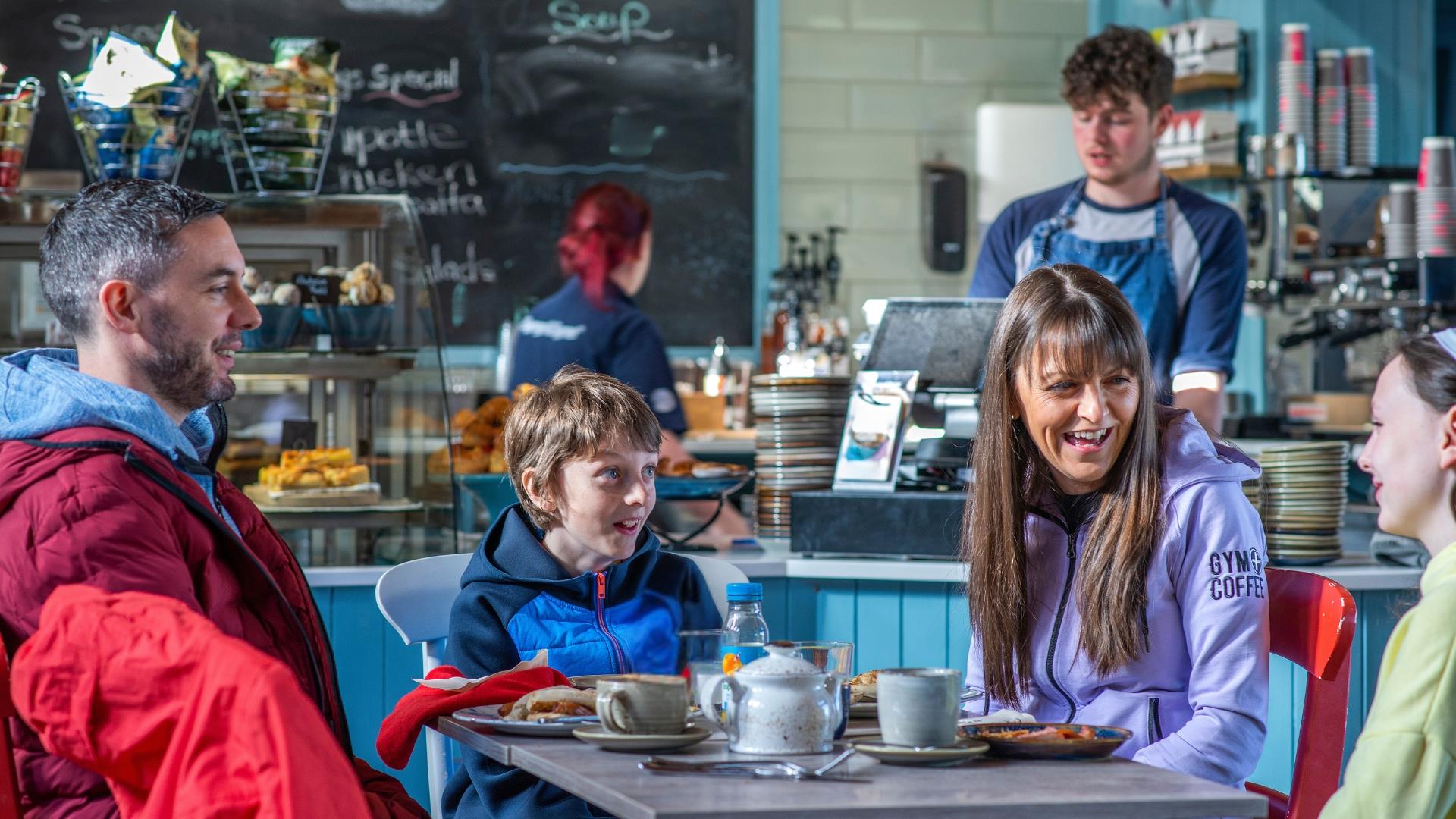 Family of four enjoying breakfast at Synge and Bryne - Kilbroney Park