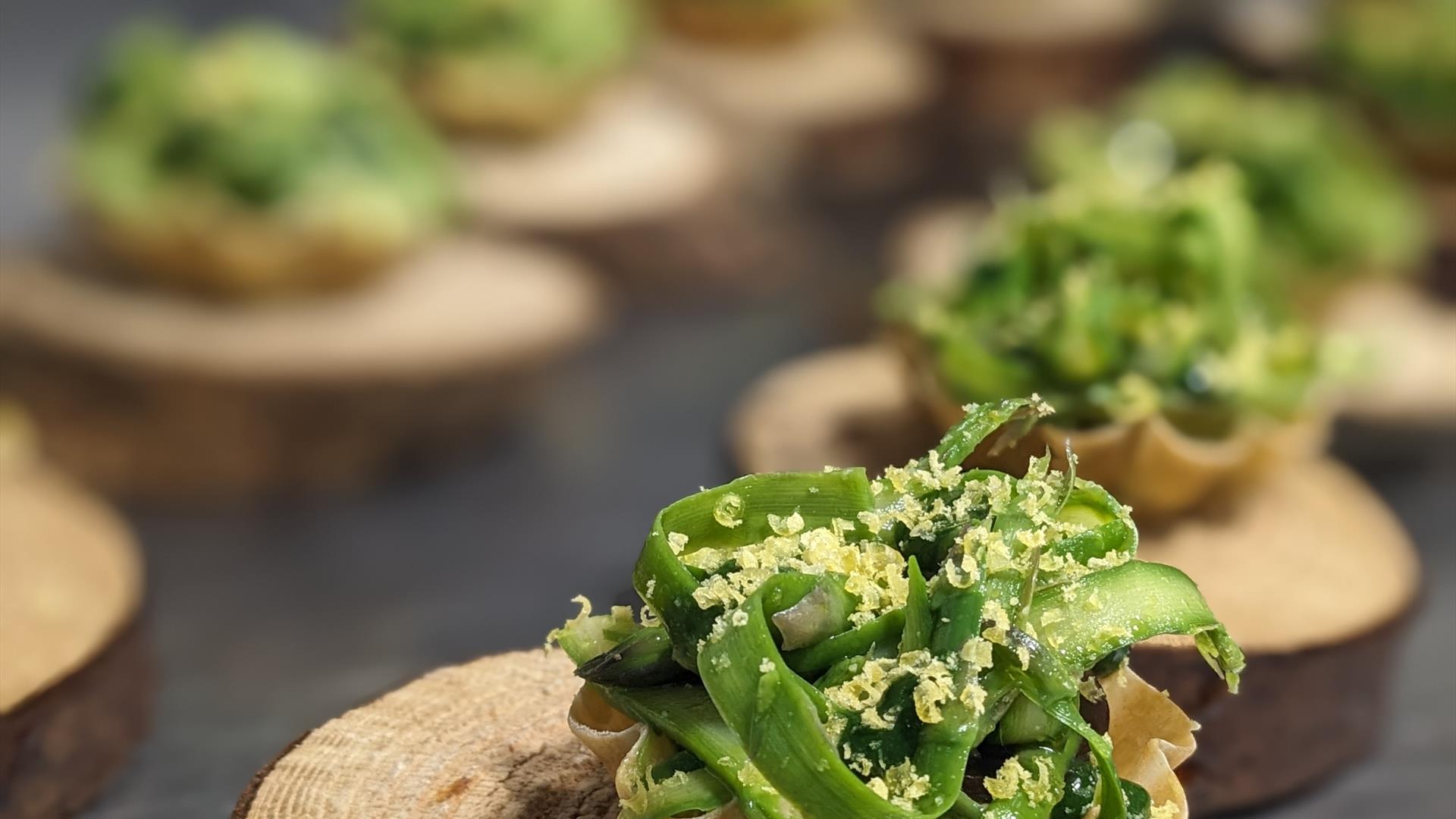 Supper Club at Scopers, Dundrum. Tasting menu of small parcels with green foilage with truffle shavings.