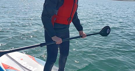 woman paddle boarding at castlewellan