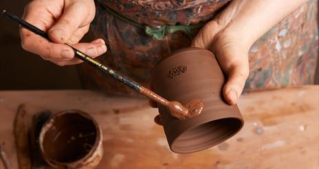 painting pottery at Down Arts Centre