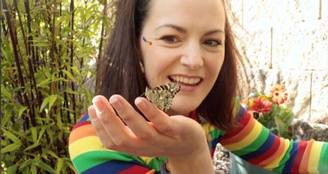 Bop holding a butterfly