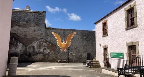 A Fearow in the museum courtyard