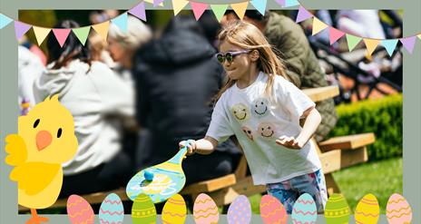 Image of young girl playing bat and ball in Montalto Estate, with Easter animated graphics