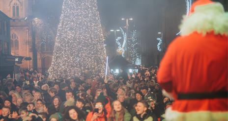 Santa switching on the Christmas tree lights in Newry City