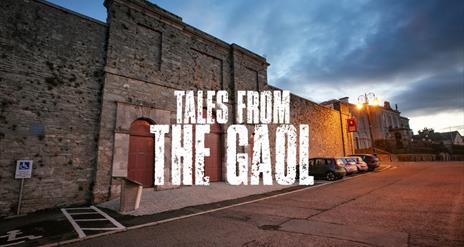 An exterior shot of Down County Museum with the text "Tales from the Gaol" overlaid