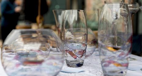 Drinking glasses on craft-vendor's table